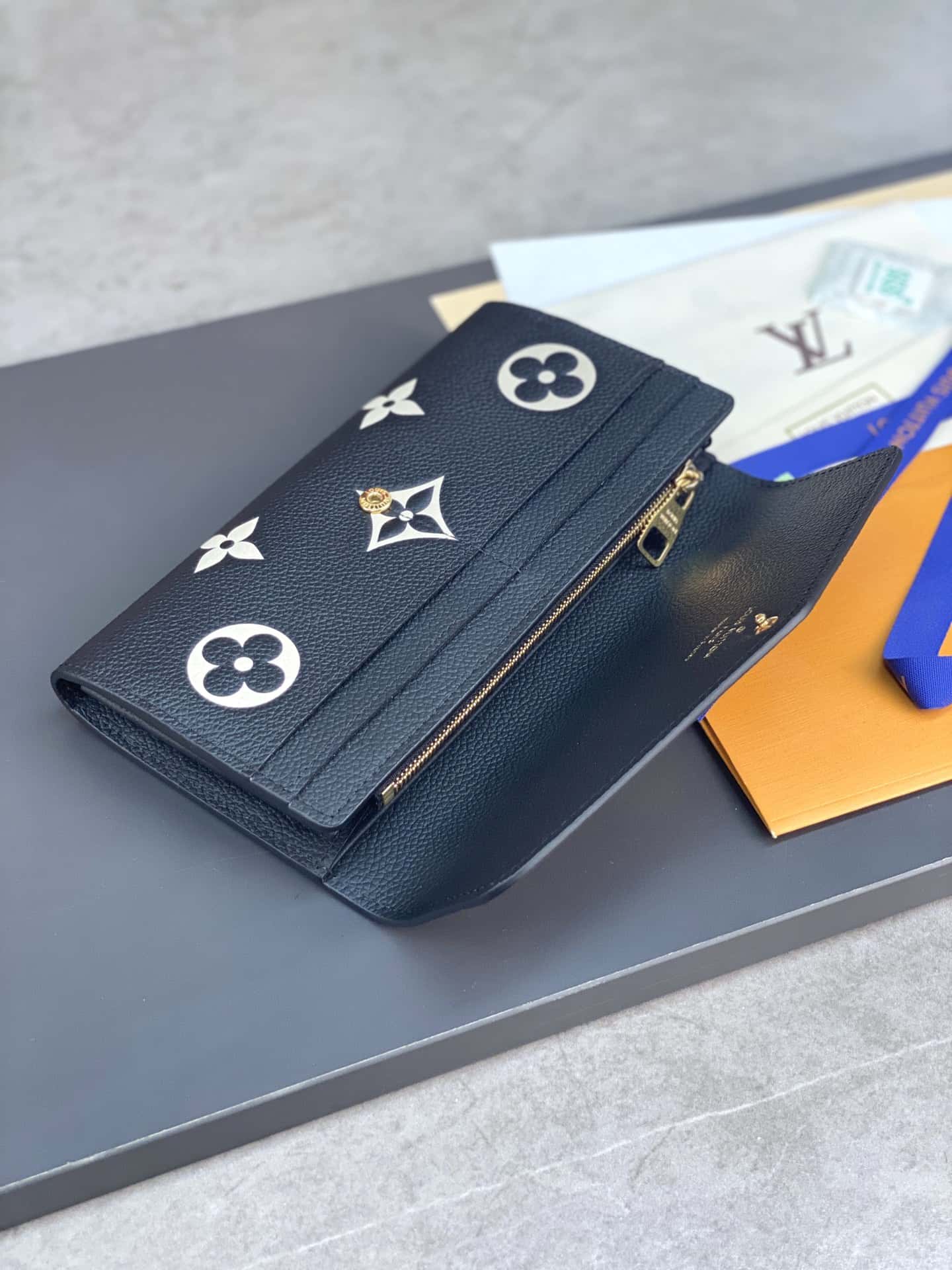 Shop Louis Vuitton MONOGRAM EMPREINTE Sarah wallet (M80496) by