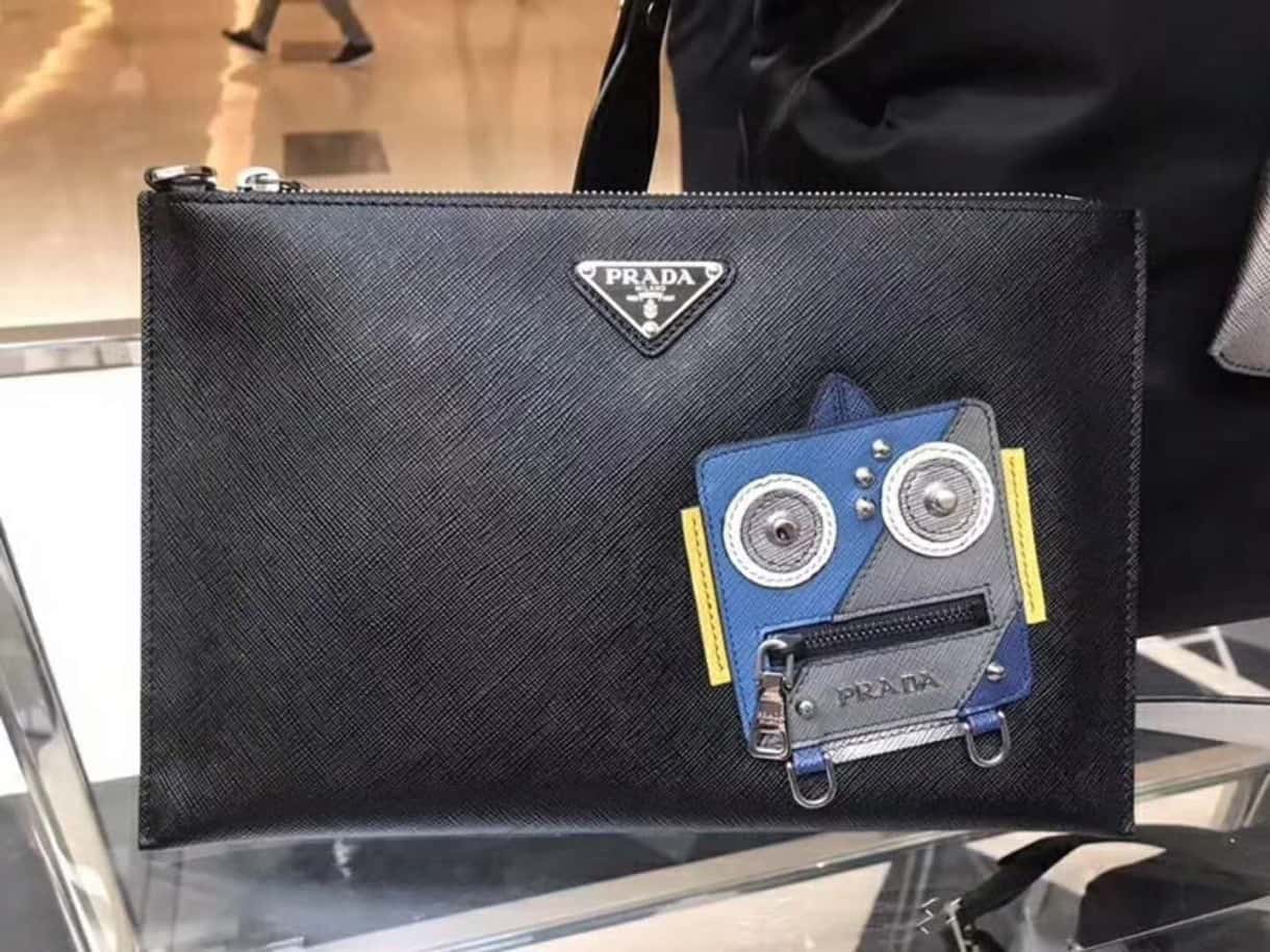 PRADA普拉达进口十字纹牛皮男士手包2VG005